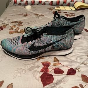 Nike flyknit racer size 10. Pre owned.